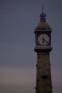 Clock tower against sky