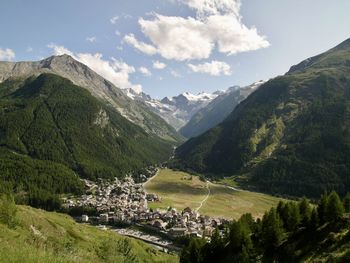 Scenic view of landscape and mountains against sky