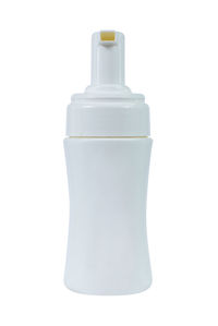 Low angle view of bottle against white background