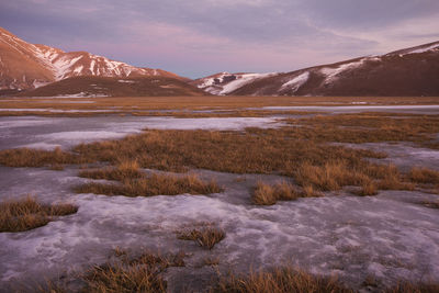 Scenic view of snowcapped mountains against sky in the national park of monti sibillini