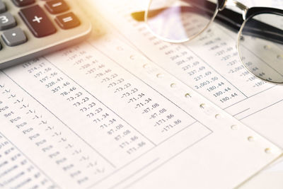 High angle view of pen on book