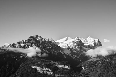 Snowcapped mountains against sky