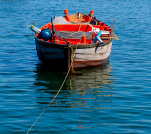 Boat moored in sea