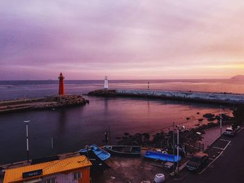 High angle view of sea against sky at sunset