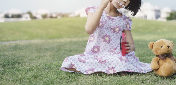 Girl blowing bubbles