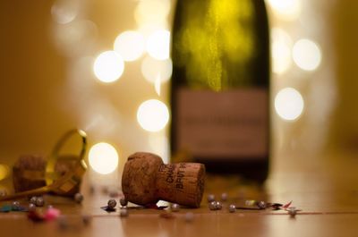 Close-up of wine glasses on table
