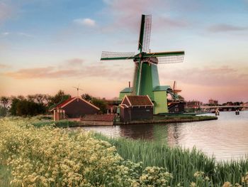 Traditional windmill against sky