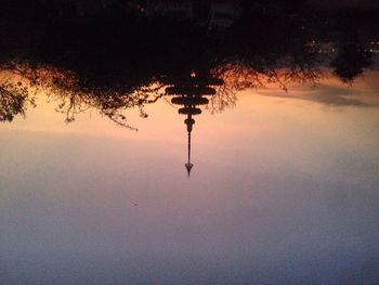 Reflection of illuminated building in water