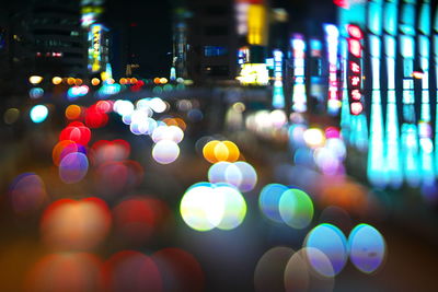 Defocused image of illuminated traffic at night