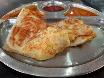 Close-up of breakfast served in plate