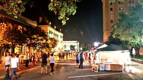 People in city at night