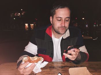 Close-up of man eating food