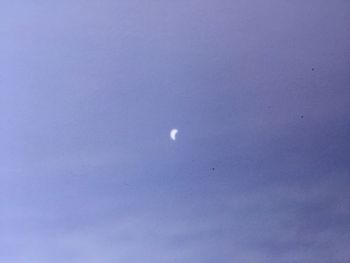 Low angle view of moon in sky