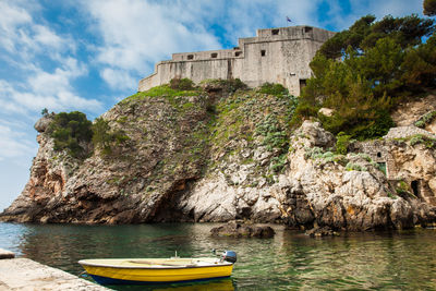 Dubrovnik west pier and the medieval fort lovrijenac located on the western wall of the city