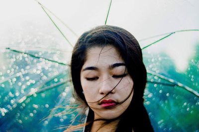 Young woman swimming in pool