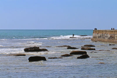 Scenic view of sea against clear sky