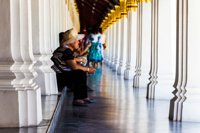 Low section of people walking in corridor