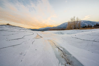 Scenic view of landscape against sky during sunset