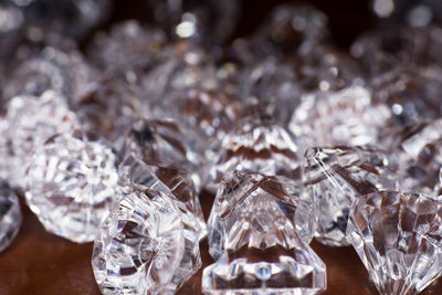 Close-up of diamonds on table 