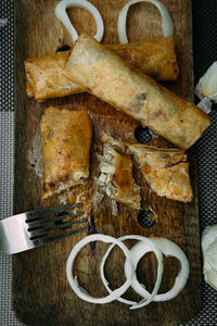 High angle view of bread on cutting board