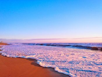 Scenic view of beach during sunset