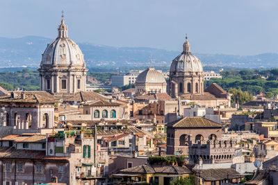 High angle view of cathedrals by buildings in city