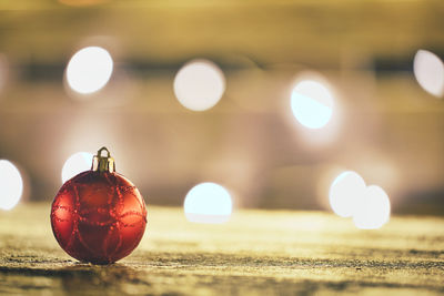 Close-up of illuminated christmas lights on table