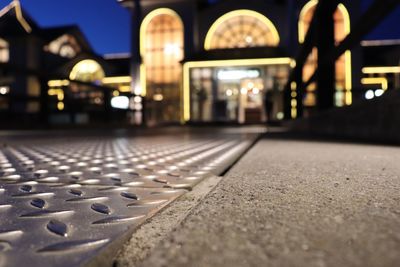 Surface level of illuminated street at night