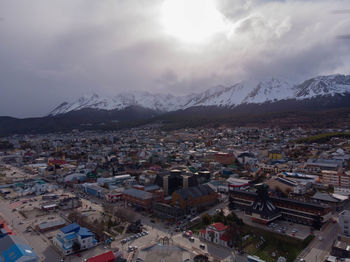 High angle view of buildings in city against sky