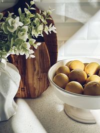 Close-up of fruits in bowl on table