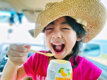 Cute girl young woman drinking juice eating yogurt 
