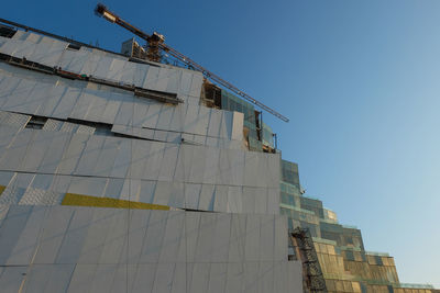 Low angle view of building against clear blue sky, icon siam