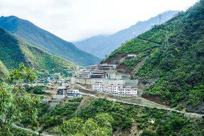 High angle view of plants and mountains against sky