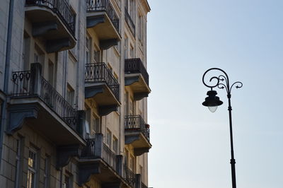 Low angle view of street light against sky