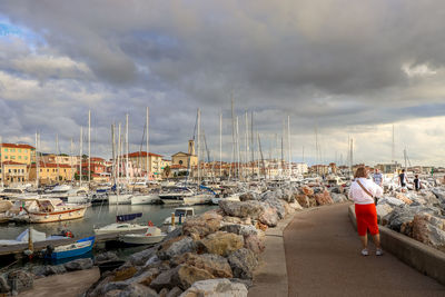 Walk of my wife in a small marina in piombino on the tuscan coast