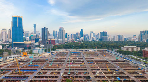 Modern buildings in city against sky