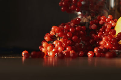 Close-up of cherries on table