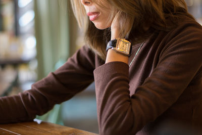 Woman sitting at cafe