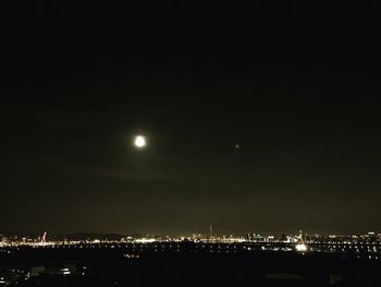 Illuminated cityscape at night