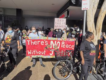 People walking on street in city