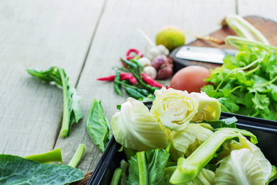 High angle view of vegetables in plate on table