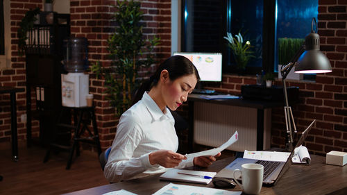 Businesswoman working at office