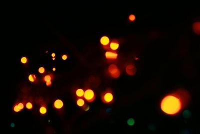 Defocused image of illuminated lights at night