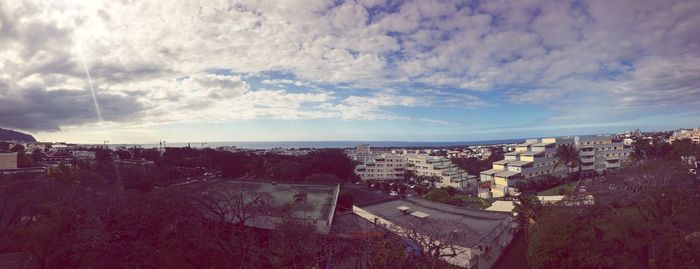 High angle view of sea against cloudy sky