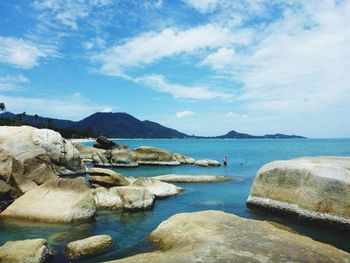 Scenic view of sea against cloudy sky