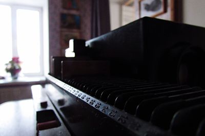 Close-up of piano at home