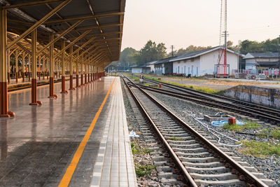 Railroad station platform against sky