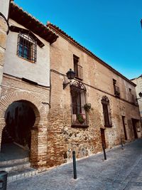 Exterior of old building against blue sky