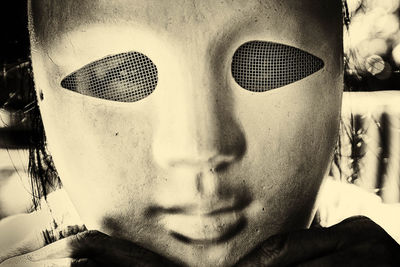 Close-up portrait of young man wearing sunglasses