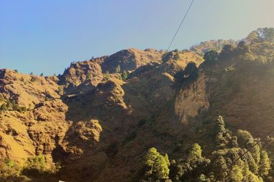 Scenic view of mountains against clear sky